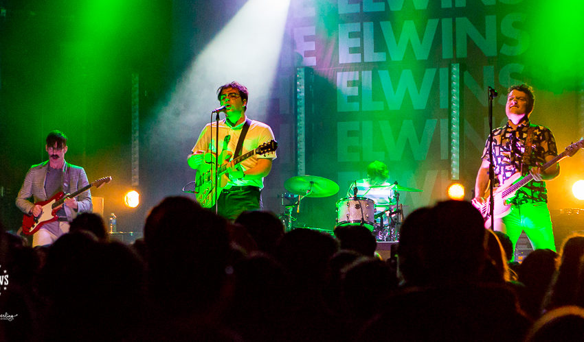 The Elwins at the Mod Club front view full band green lights with the crowd in the foreground